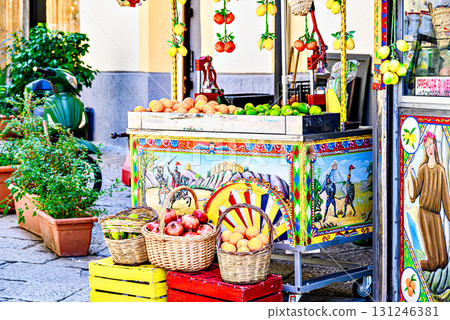 Colorful fruit and food stalls at the Vucciria market (Loggia district) in Palermo. Tapas area in the old town Colorful fruit and food stalls at the Vucciria market (Loggia district) in Palermo. Tapas area in the old town 131246381
