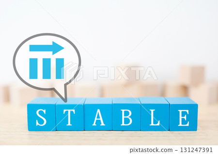 A bar graph with a blue block and a horizontal arrow indicating stability. 131247391