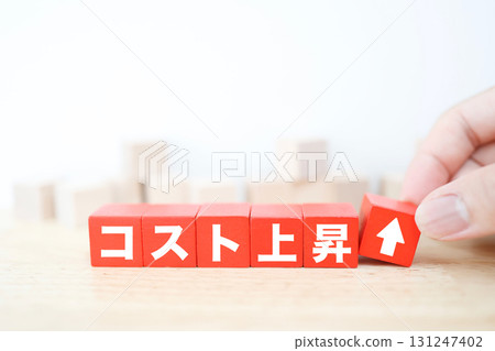 Image of rising costs. Six red blocks. Upward arrow. 131247402