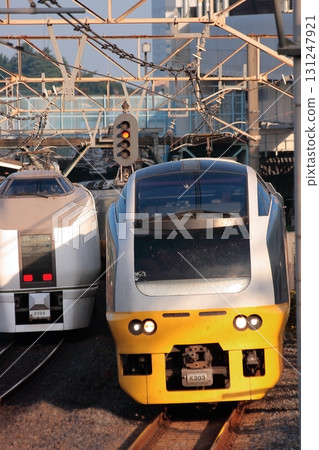 651 and 653 series trains passing each other at Ueno Station in the early morning. Photo taken on October 7, 2010. 651 and 653 series trains passing each other at Ueno Station in the early morning. Photo taken on October 7, 2010. 131247921