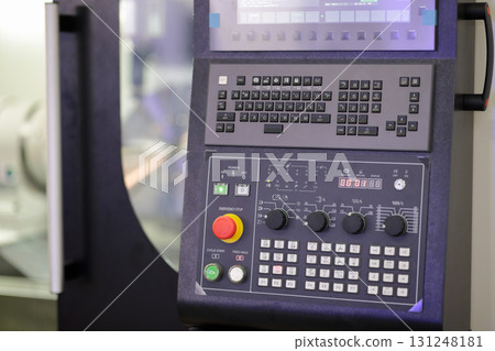 industrial CNC machining center controls closeup 131248181