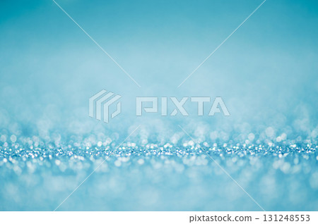 Glitter blue background with subtle focus and defocus lights. 131248553