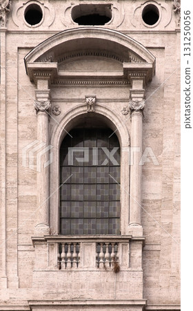 Old window on stone facade Old window on stone facade 131250056