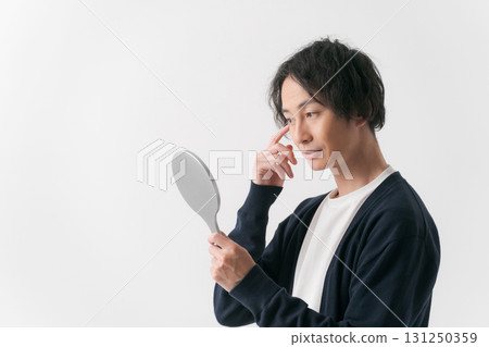 A man seeing a mirror A man seeing a mirror 131250359