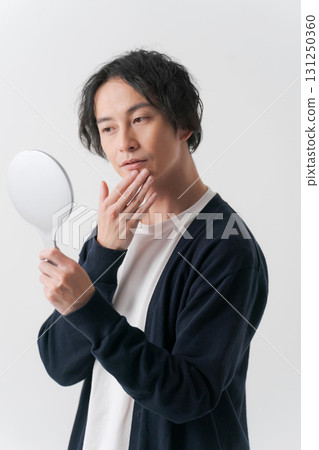 A man seeing a mirror A man seeing a mirror 131250360