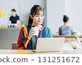 A young woman working in a cafe 131251672