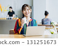 A young woman working in a cafe 131251673