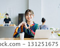 A young woman working in a cafe 131251675