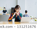 A young woman working in a cafe 131251676