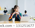 A young woman working in a cafe 131251677