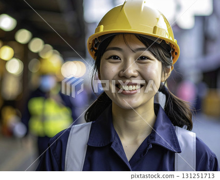 Female worker working in a factory 131251713