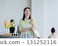 A young woman visiting a cafe 131252116