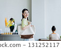 A young woman visiting a cafe 131252117