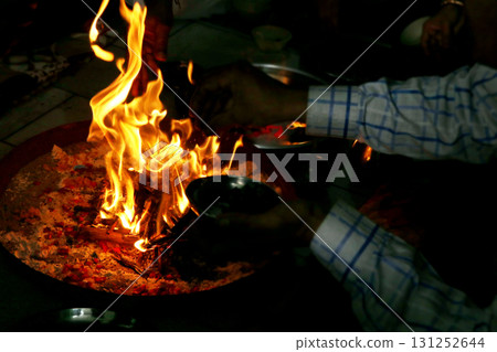 Sacred Fire Ritual in Hindu Puja Ceremony Sacred Fire Ritual in Hindu Puja Ceremony 131252644