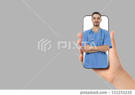 Doctor using smartphone tech to showcase medical skills 131253220