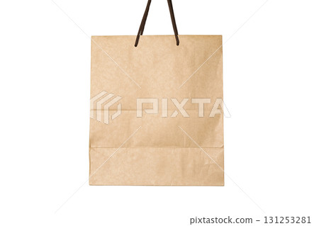 A brown paper shopping bag with handles is shown, isolated on white, PNG A brown paper shopping bag with handles is shown, isolated on white, PNG 131253281