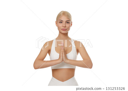 Female yoga practitioner doing a prayer pose, isolated, PNG 131253326
