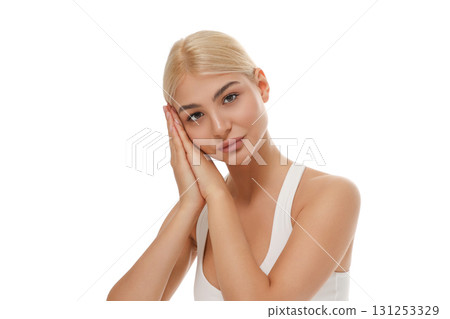 Young woman smiles in a calming yoga pose, isolated, PNG Young woman smiles in a calming yoga pose, isolated, PNG 131253329