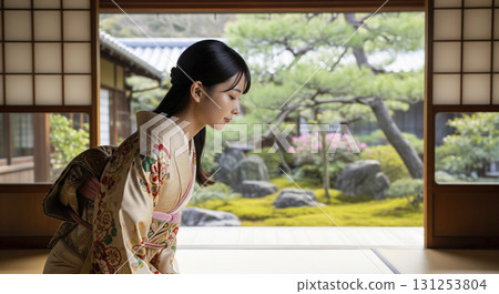 Japanese woman in kimono sitting upright and bowing Japanese woman in kimono sitting upright and bowing 131253804