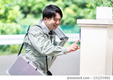 Contractor greeting over the intercom 131253902