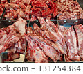Fresh Cuts of Raw Meat Displayed at Butcher Shop 131254384