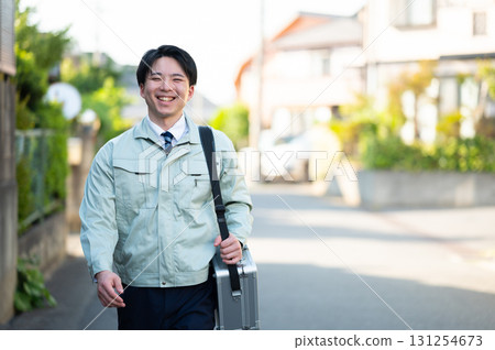 A young businessman walking A young businessman walking 131254673