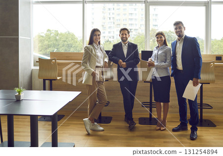 Business people team standing together posing for corporate portrait 131254894