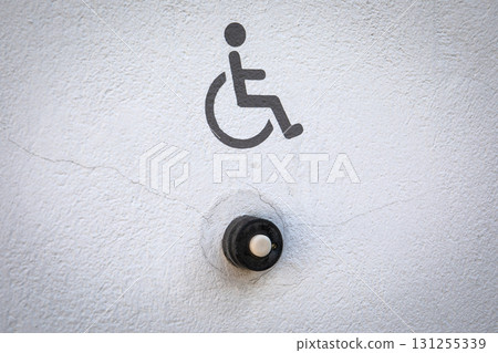 Accessibility Doorbell Button with Wheelchair Symbol Sign 131255339