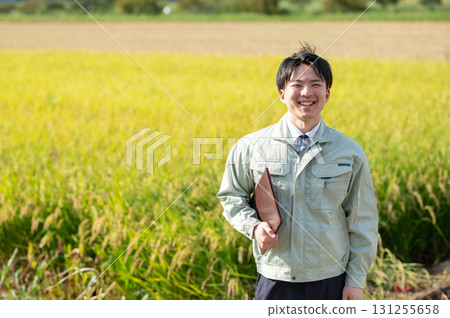 Rice field and staff Rice field and staff 131255658