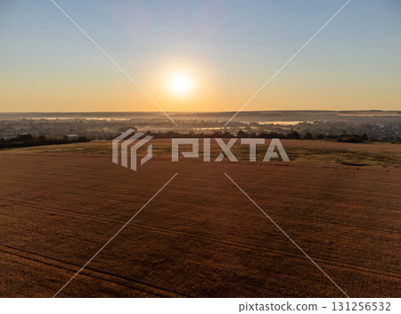 Aerial Sunrise Over Golden Wheat Field 131256532