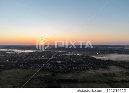 Aerial Sunrise View Over Foggy Countryside 131256635