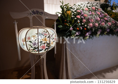 Flowers and lanterns displayed at the funeral hall 131256829