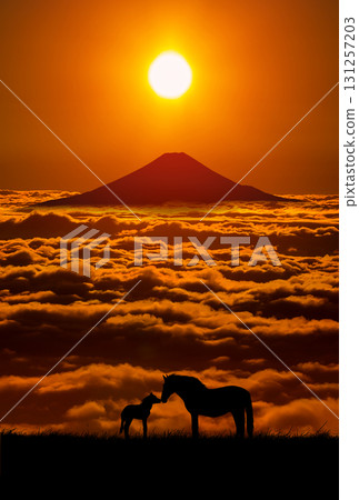 Mount Fuji and the silhouette of a horse in the morning sky 131257203