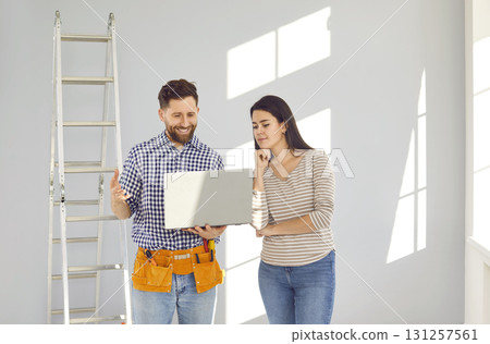 Young married couple is planning an apartment renovation and design project. 131257561