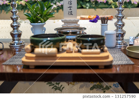 A plain wooden memorial tablet placed on the front desk of the funeral hall 131257590