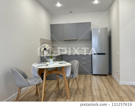 new stylish kitchen set in a modern apartment interior new stylish kitchen set in a modern apartment interior 131257619