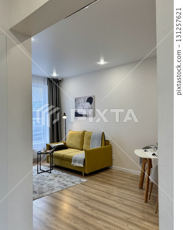 modern living room in a stylish interior of a new apartment with designer renovation modern living room in a stylish interior of a new apartment with designer renovation 131257621