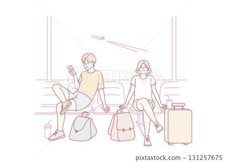 Happy couple in airport excited about travel 131257675