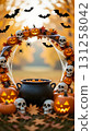 A frame consisting of a garland of Halloween elements: pumpkins, a black cauldron, skulls, cobwebs and spiders, bats, and cheerful ghosts 131258042