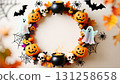 A frame consisting of a garland of Halloween elements: pumpkins, a black cauldron, skulls, cobwebs and spiders, bats, and cheerful ghosts 131258658