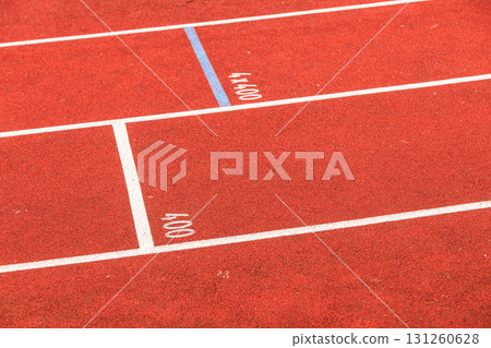 Red running track in stadium. 131260628