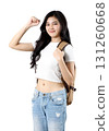 young beautiful woman in casual clothes, carries backpack go to vacation 131260668