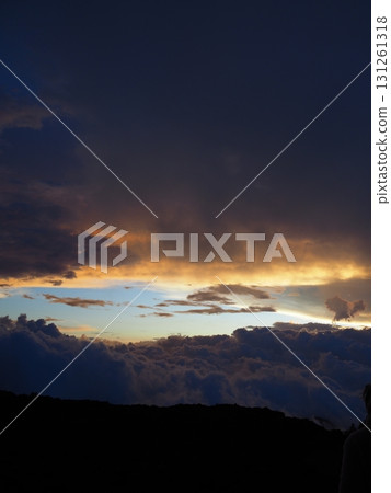 Sunset seen from above the clouds 131261318