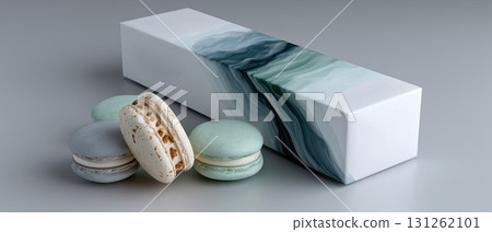 A person holds a beautifully wrapped box filled with colorful macarons, showcasing a warm and inviting atmosphere. A person holds a beautifully wrapped box filled with colorful macarons, showcasing a warm and inviting atmosphere. 131262101
