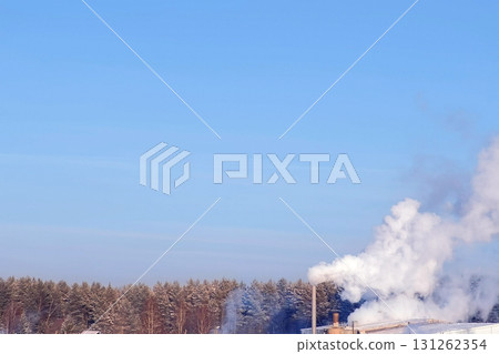 White smoke from the pipes of plant on the outskirts of industrial district. White smoke from the pipes of plant on the outskirts of industrial district. 131262354