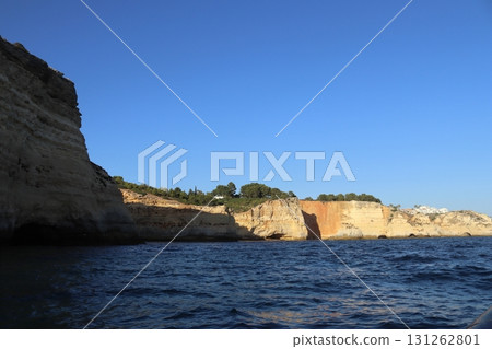 Sunlit Coastal Cliff in Algarve, Portugal 131262801
