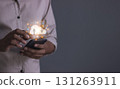 Young man with smartphone mobile hand touching to cloud computing diagram, Data storage 131263911