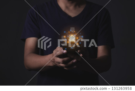 Customer Review, Young Man hand holding Smart Phone with five star to review and give 5 stars Customer Review, Young Man hand holding Smart Phone with five star to review and give 5 stars 131263958