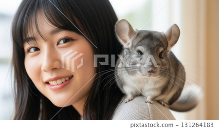 Chinchilla on woman's shoulder 131264183