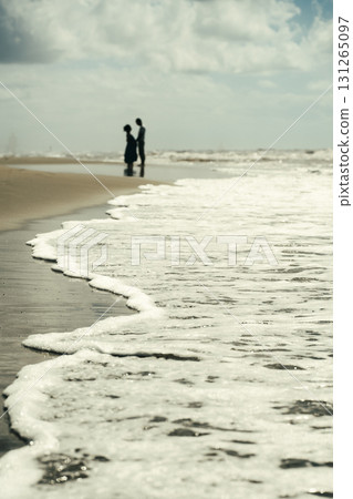 Coastal Stroll with Ocean Waves Crashing on Shore 131265097